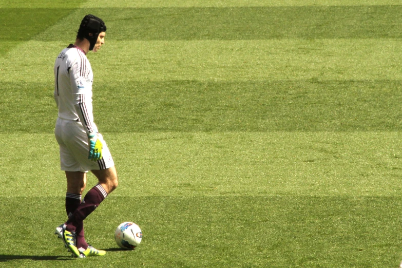 a soccer player has his shoes on while playing