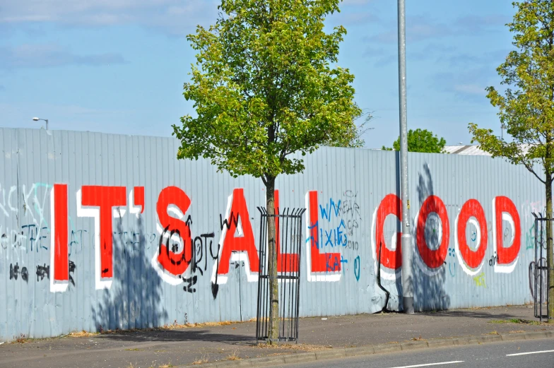 graffiti is displayed on the wall outside a building