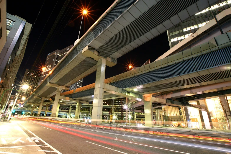 the view from an empty road at night