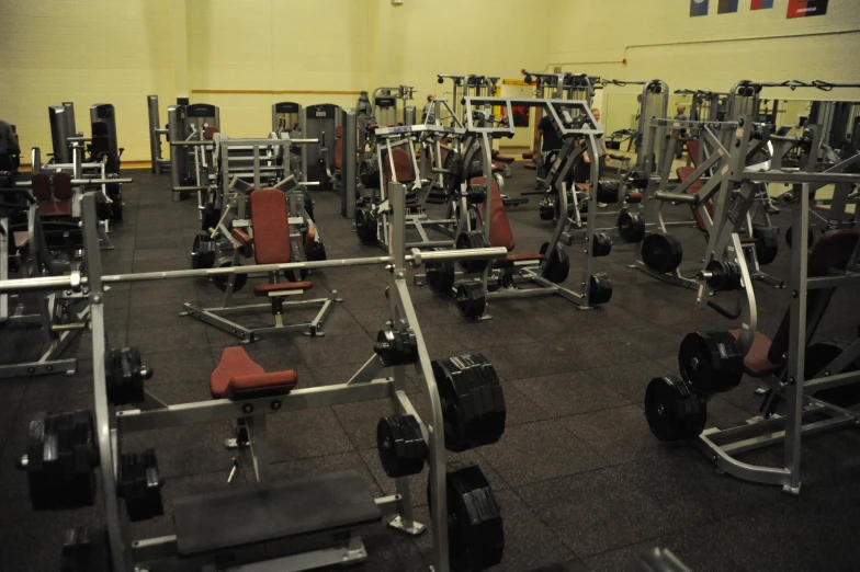 the large gym has many equipment in it