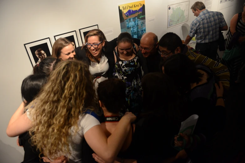 a group of people in an art gallery