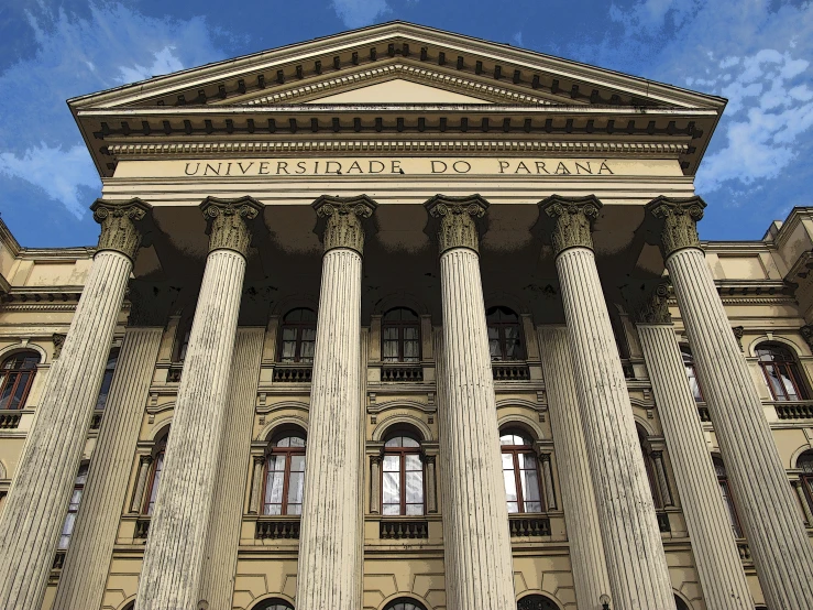 a group of white pillars on the front of an old building