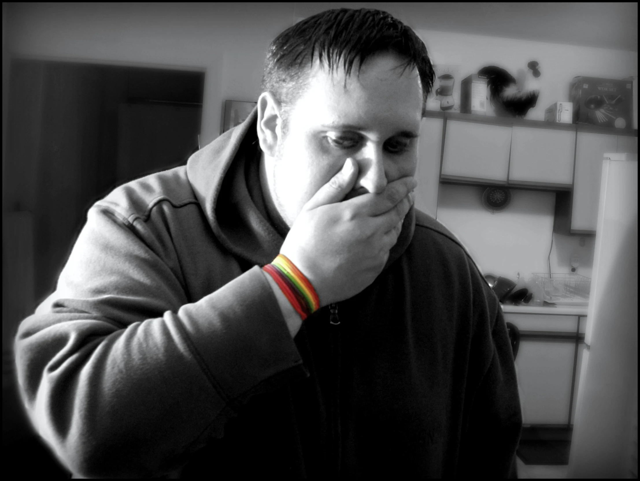 black and white pograph of man looking away from the camera