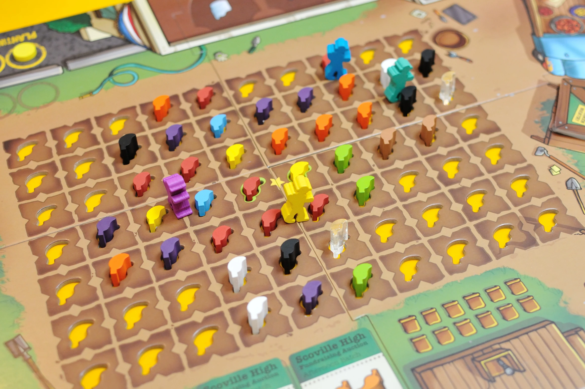 a board game that includes several small animals