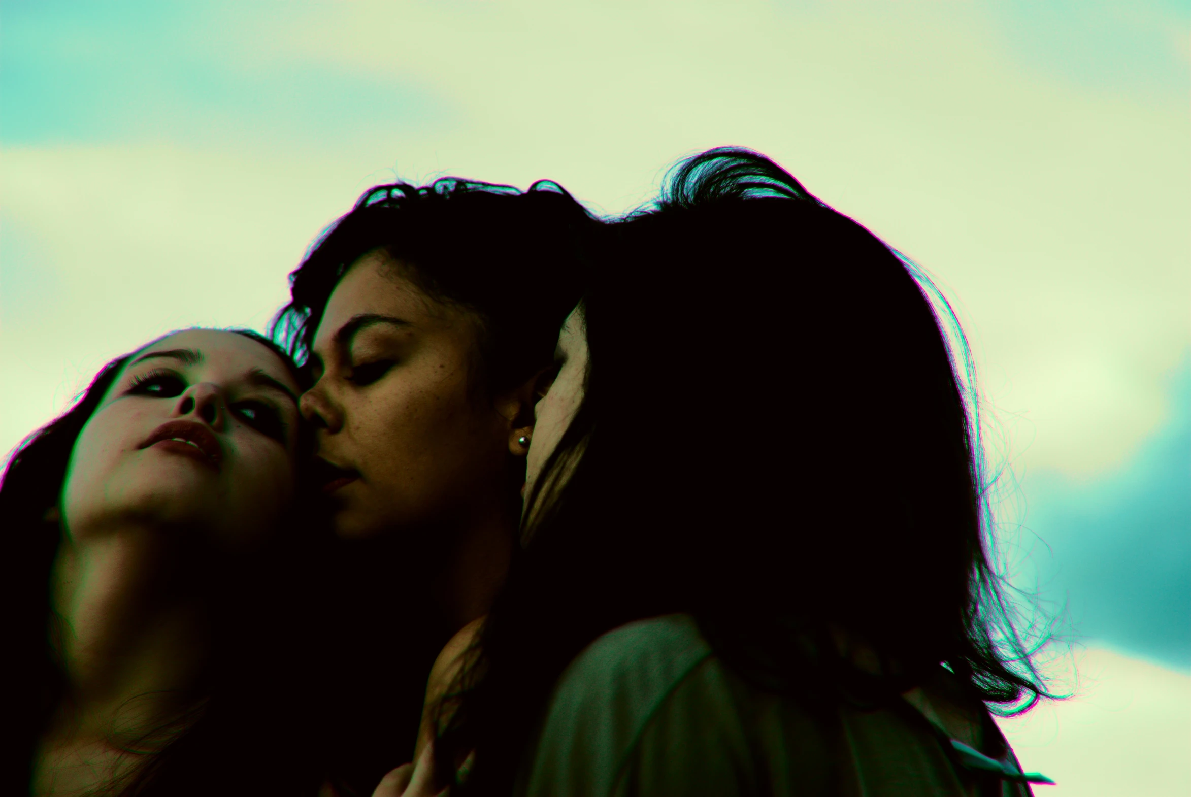 two women who are both wearing earrings