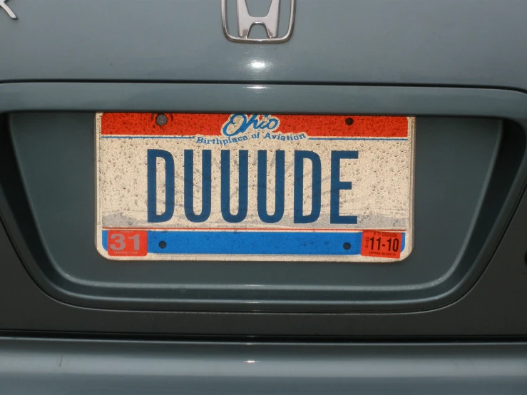 a license plate that says duwude on a car