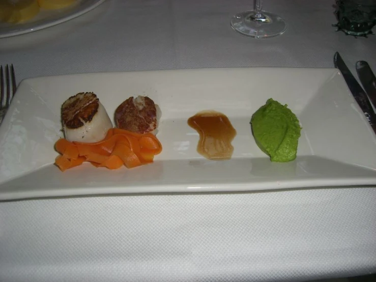 four different types of food on a plate