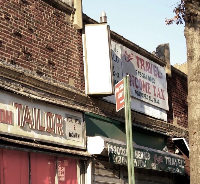 this is an image of store fronts on the side of a building