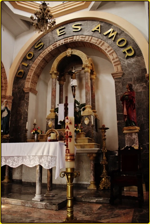 the inside of a church, decorated with an arch and a altar