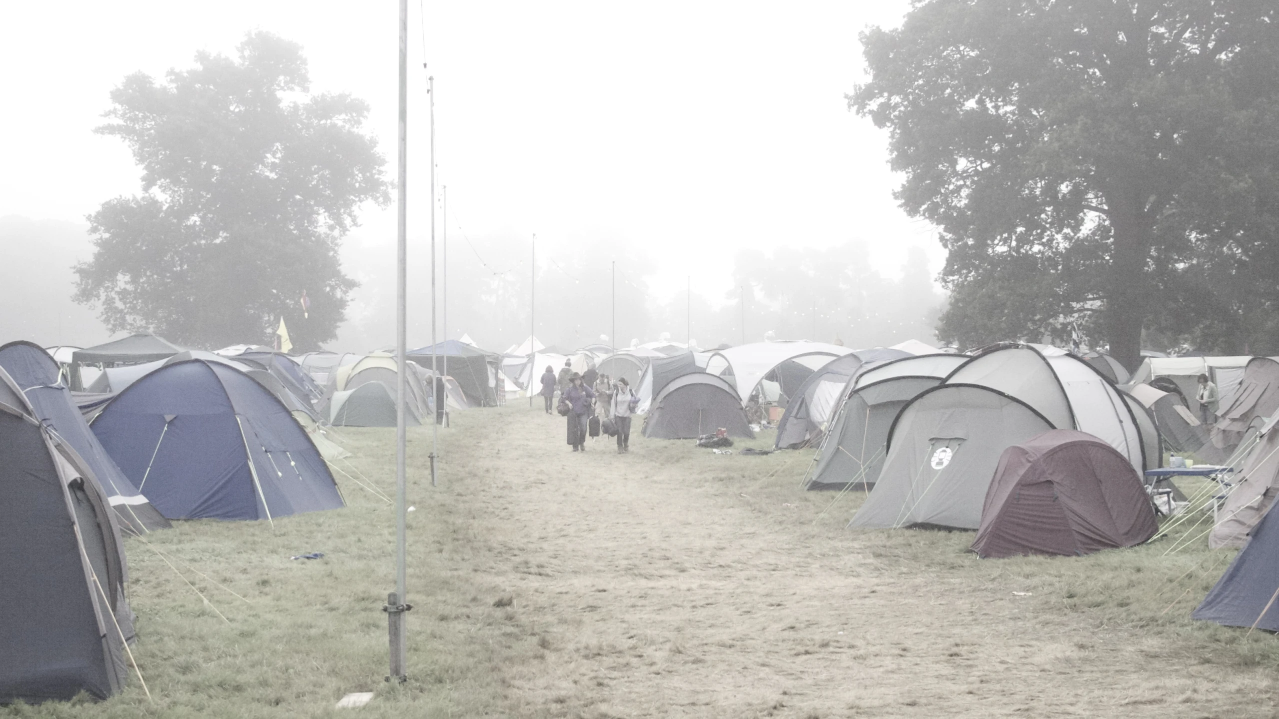 a large group of tents in a field