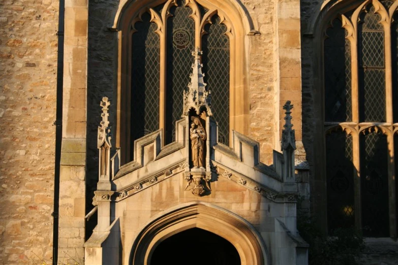 a close up of the entrance to a castle style building