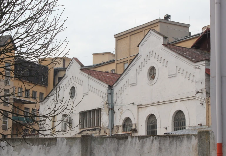 a po of old buildings on the side of a wall