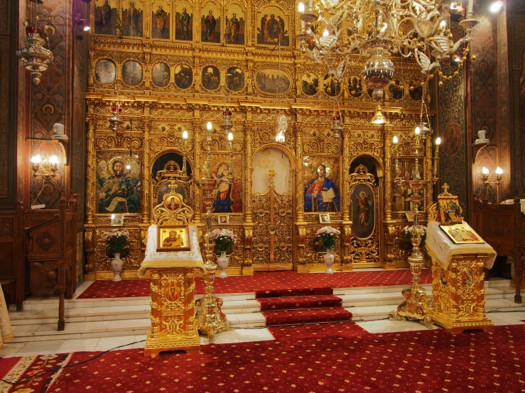 the interior of a golden altar in a church