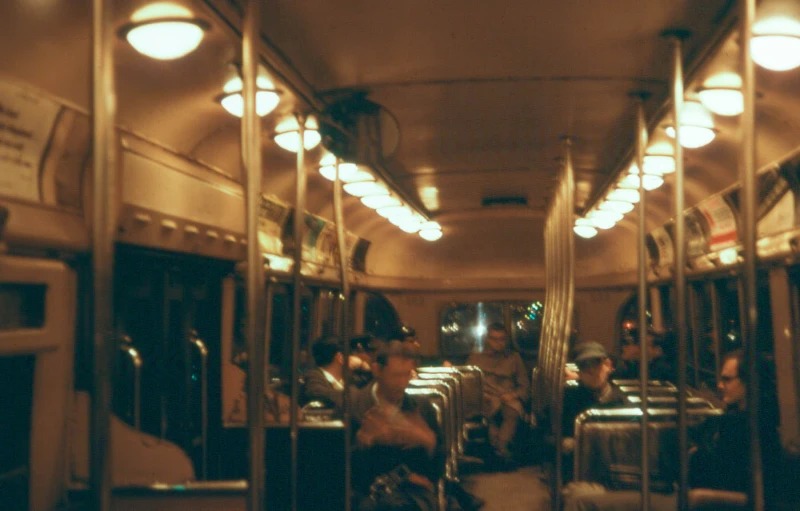 a crowded train is shown with lots of windows