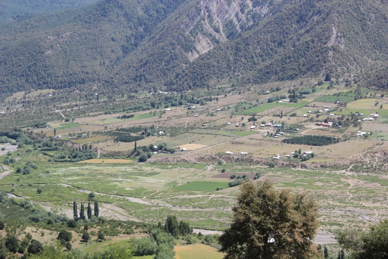 a small town nestled in the valley below