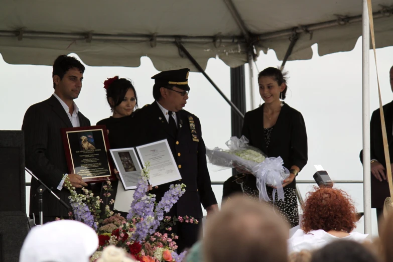 a military personnel being honored at an event