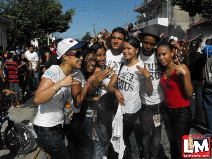 a bunch of people that are standing on the street