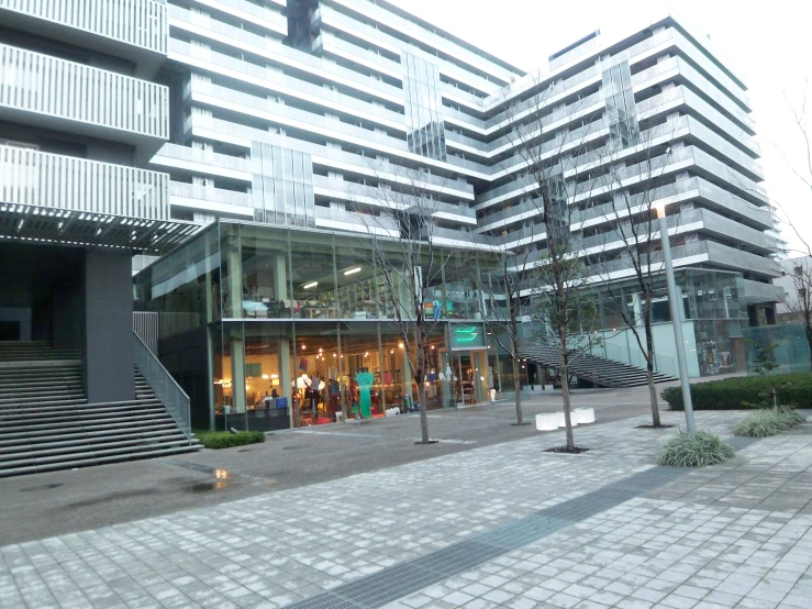 a building with a couple of street lights near it