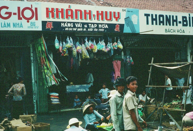 the street vendor is making his shop in vietnam
