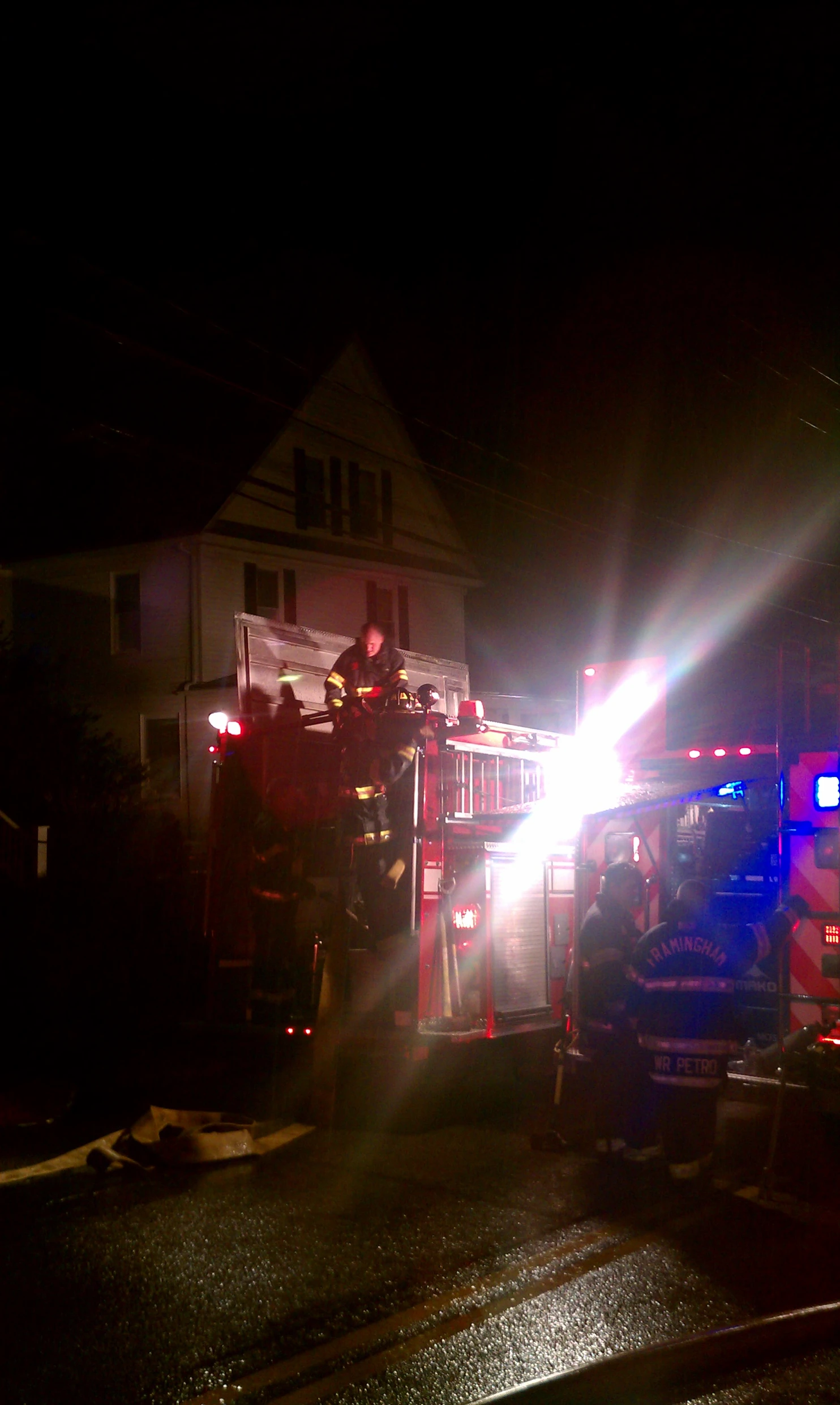 firefighters work in an accident at night time