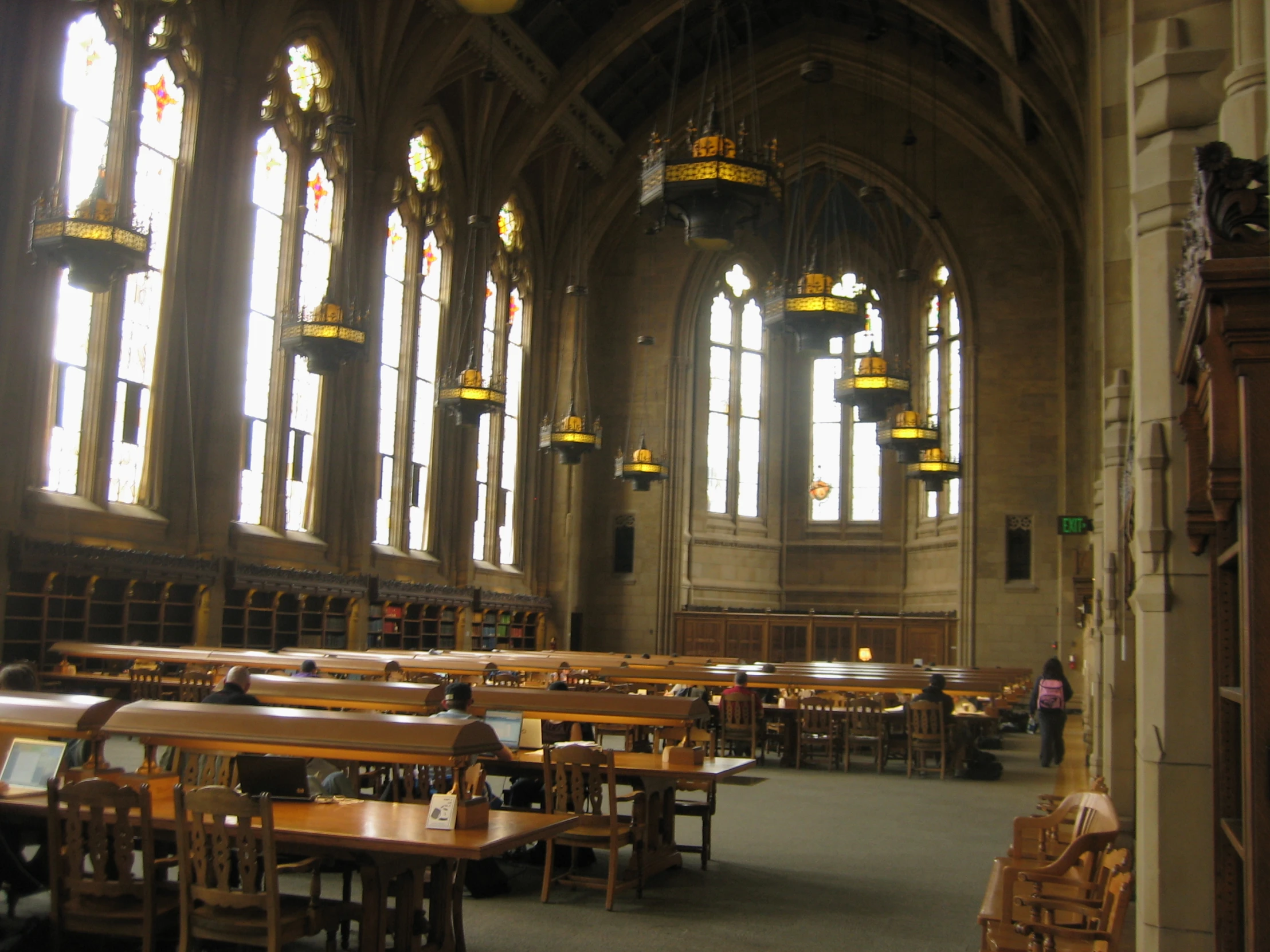 a large building with tables and chairs inside