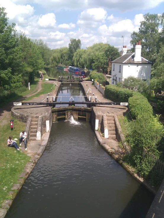 a small canal running between two buildings