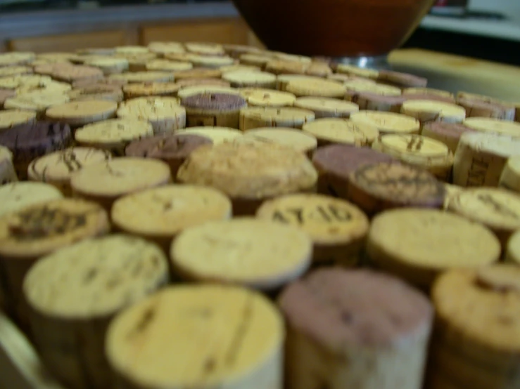 closeup of various wine corks sitting on a table