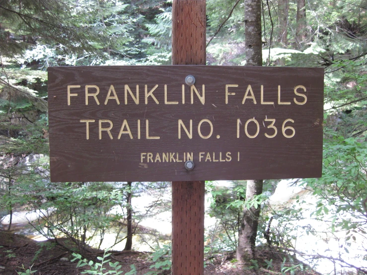 an image of sign that warns hikers to franklin falls trail