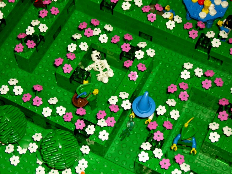 legos lying on the floor and in flower garden