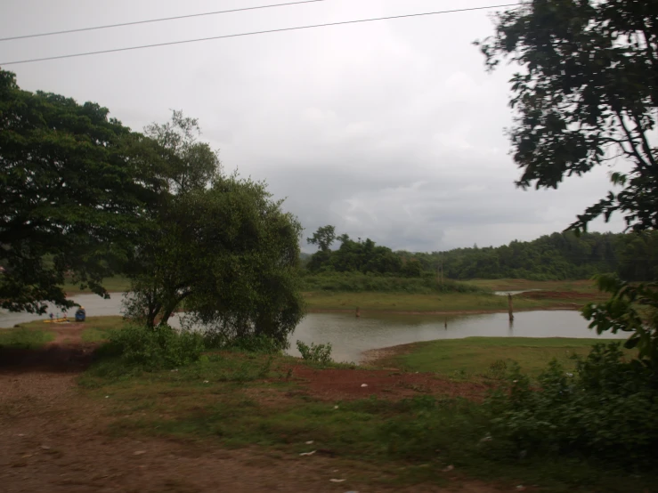 there is a body of water with lots of trees next to it