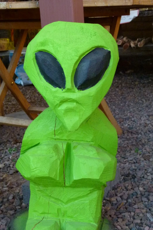 there is a green alien that is painted