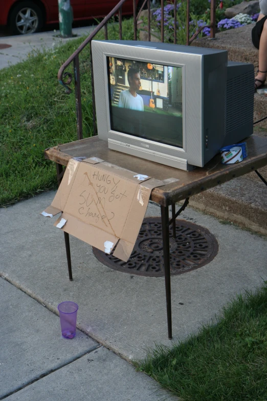 a television that has been placed on a bench