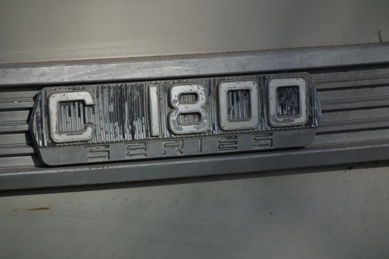 a close up of the numbers in this metal piece