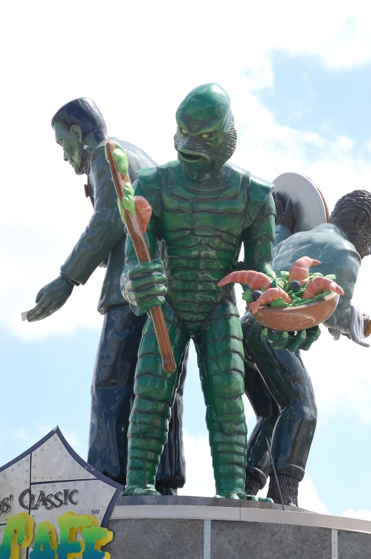 a statue with an assortment of items for sale