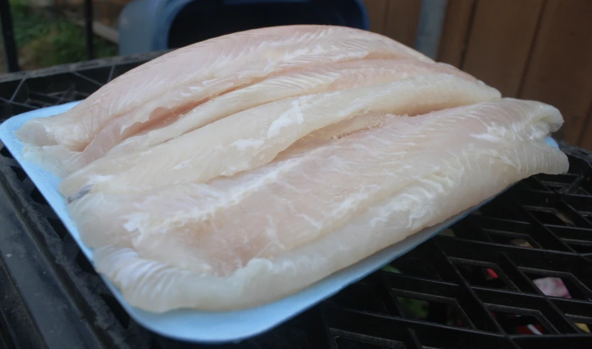 two pieces of skin on top of a white dish