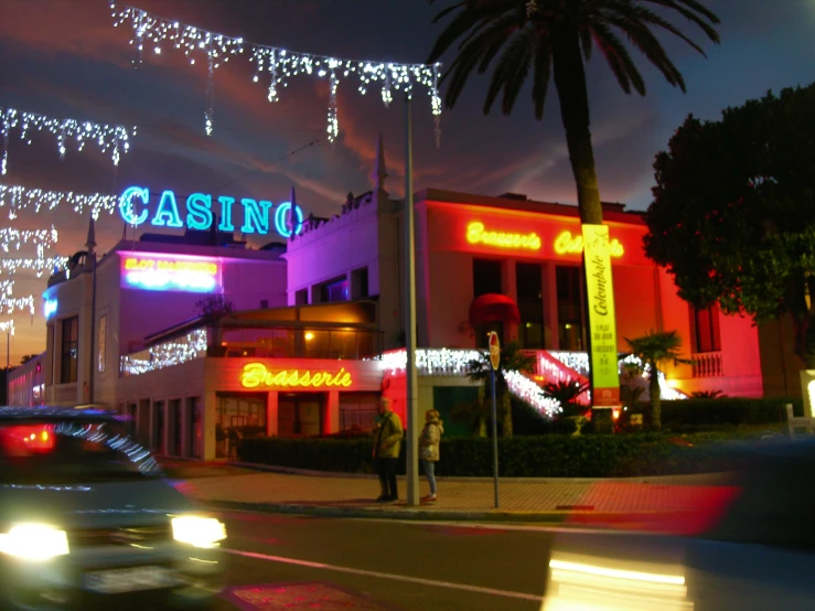 people playing on their christmas cards in the evening