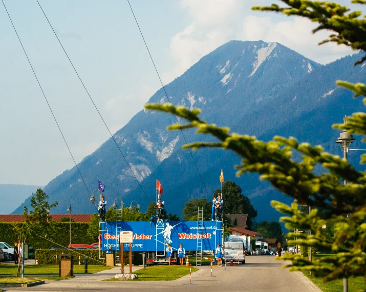 the mountains with signs line this town's main street