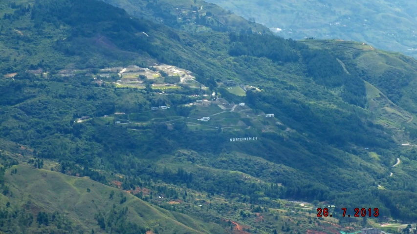 some very pretty looking green mountains with lots of trees