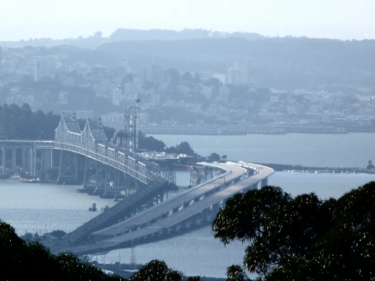 this is a po of a bridge on the side of a river