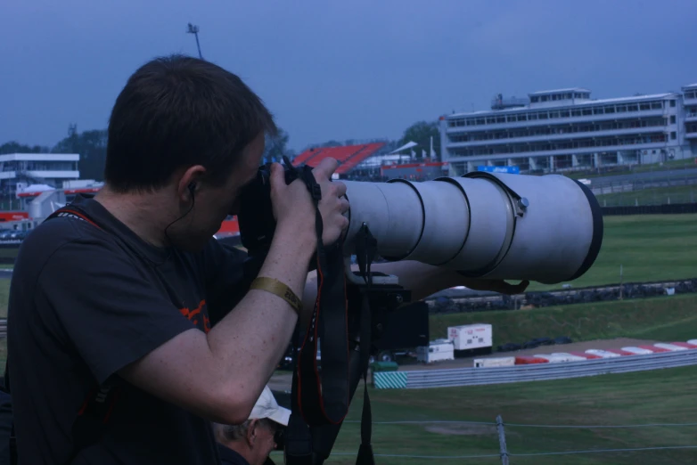 a man taking pictures with a camera