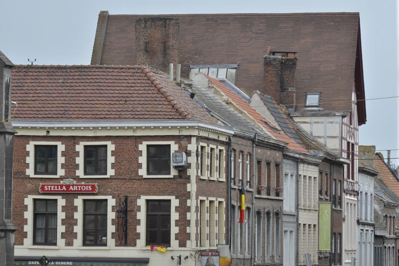 old buildings and bricked homes on an empty street