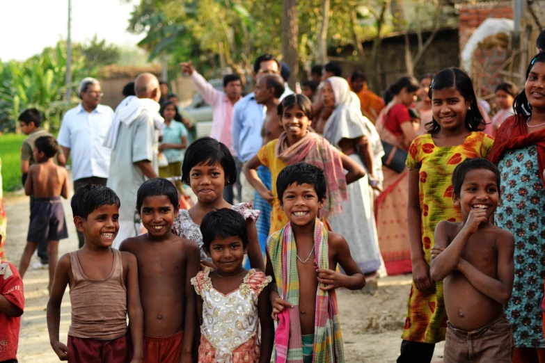 the young children are all posing for a picture