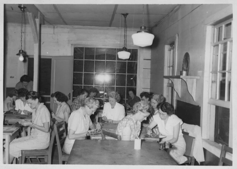 vintage black and white pograph of girls at desk