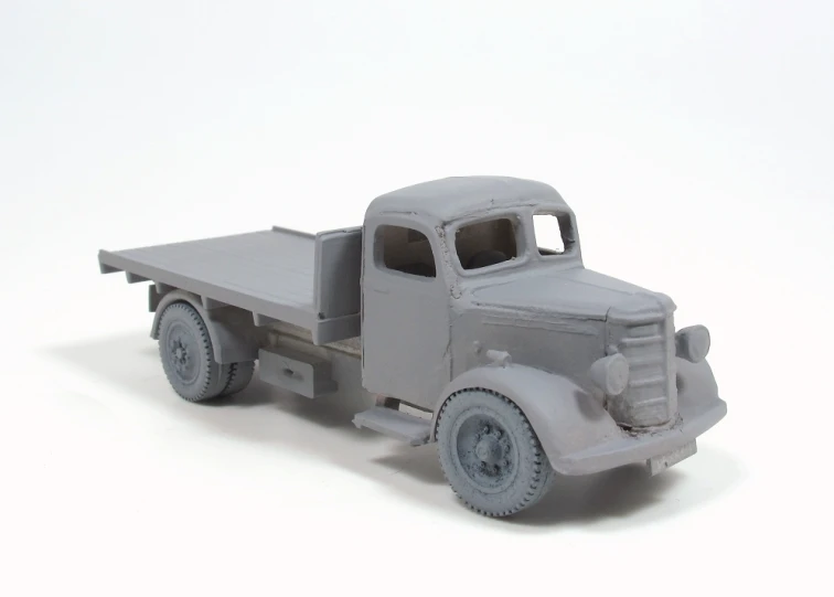 a model truck on a white background, with an old design