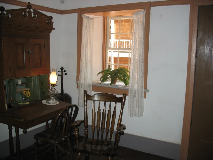 a table and a chair in a room