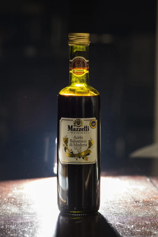 bottle of extra virgin cooking oil on a wooden surface