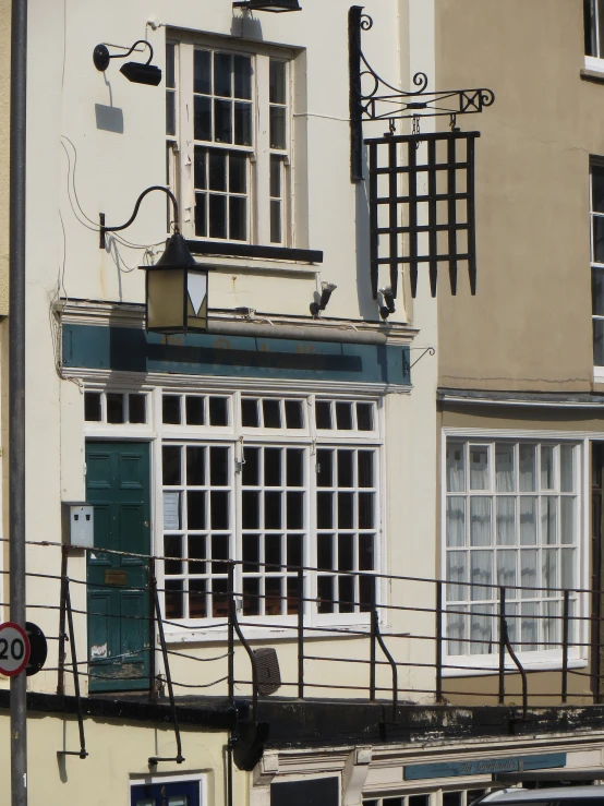 a close up of a building with a blue door