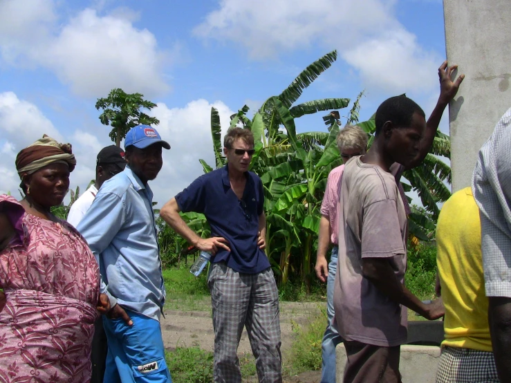 a group of people standing near each other