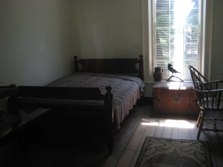 a bedroom with a large bed and lots of furniture