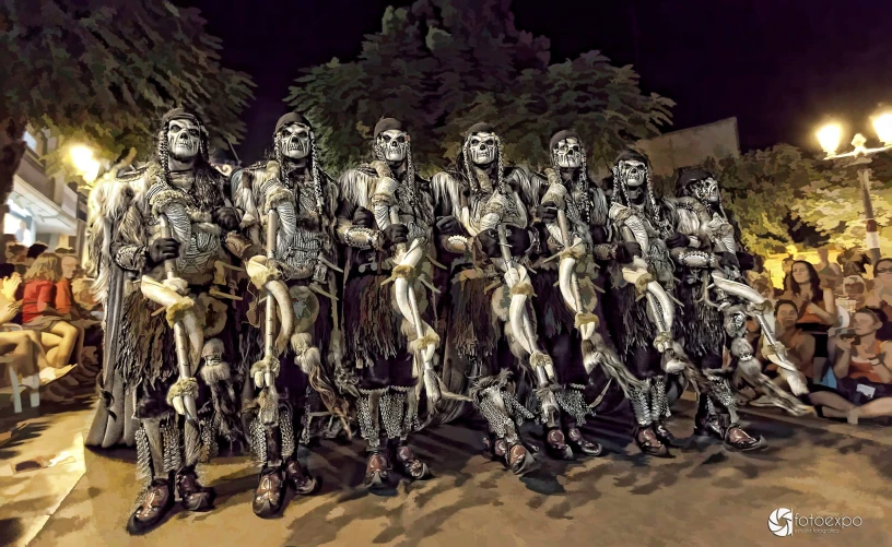 a group of people dressed up in skeleton costumes